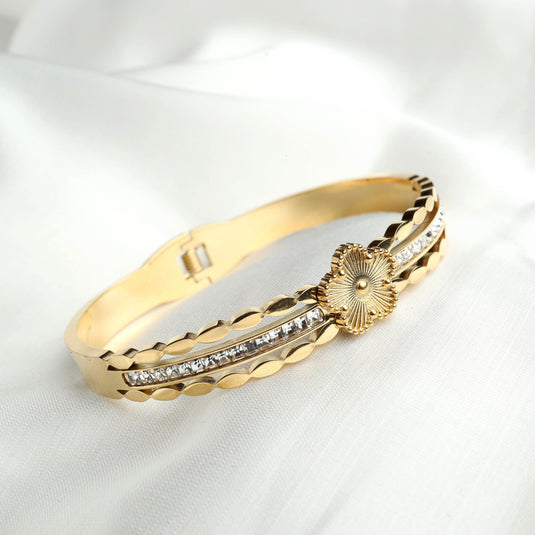 QuinShine elegant gold bracelet with crystal accents and floral starburst design designer starburst jewelry