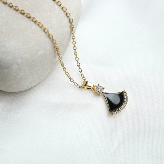 Elegant Gold Leaf Pendent Necklace with black enamel and small sparkling crystals on gold chain