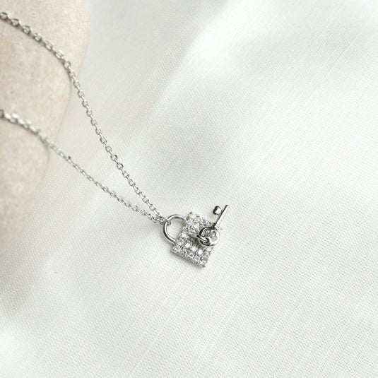 Silver fashionable key charm Necklace with sparkling lock and key pendant on delicate chain