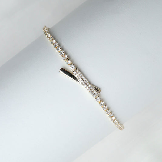Elegant Intersect Sparkle Gold Bracelet with sparkling stones and sleek gold design