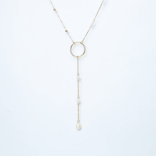 QuinShine delicate long chain lariat necklace with pearls and a circular centerpiece