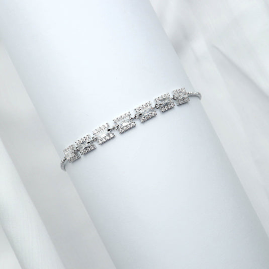 QuinShine elegant Silver Link Bracelet for Women with sparkling embedded stones on a white display