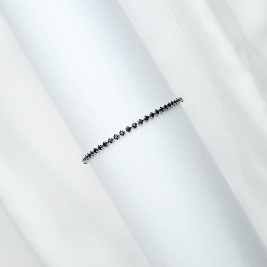 QuinShine elegant black diamond tennis bracelet with a sleek and delicate design