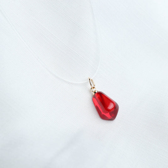 QuinShine elegant sheer necklace with a red glass teardrop pendant on a transparent cord