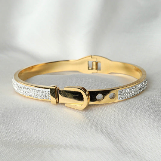 Elegant crystal gold bracelet for women featuring a clasp and sparkling embellishments