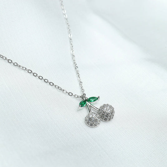 QuinShine dainty necklace for women with silver chain and cherry pendant with green leaves and sparkling crystals