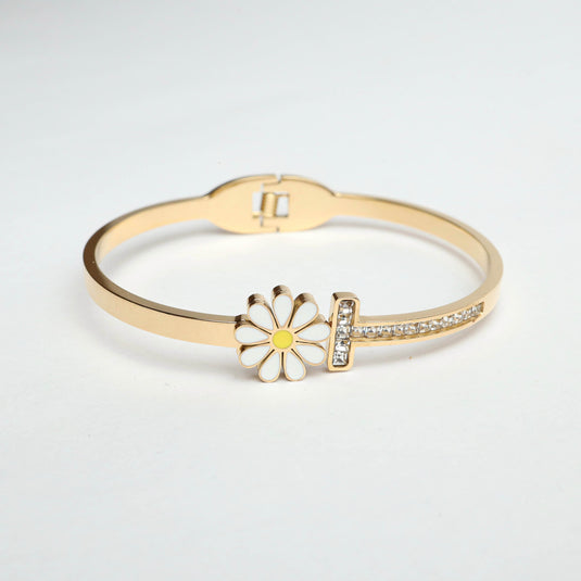 QuinShine Daisy Charm Gold Bracelet with white enamel daisy and sparkling stones on gold band