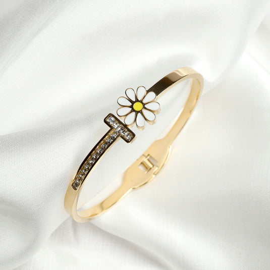 QuinShine Daisy Charm Gold Bracelet with white enamel flower and crystal accents on gold band