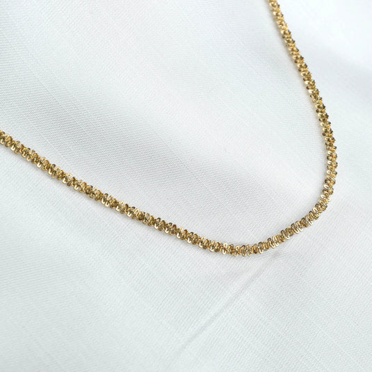 QuinShine delicate chain necklace for women in gold tone displayed on white fabric background