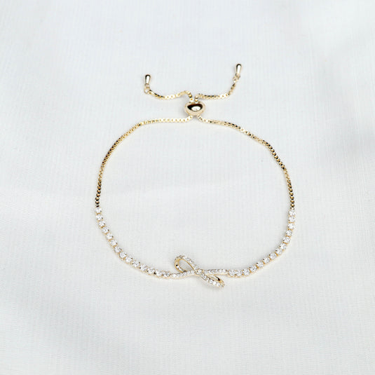 Delicate gold bracelet for women with small crystals and adjustable chain from QuinShine