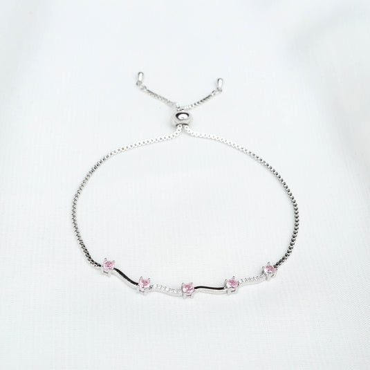 QuinShine delicate rose gold bracelet with pink stones and adjustable chain on white background