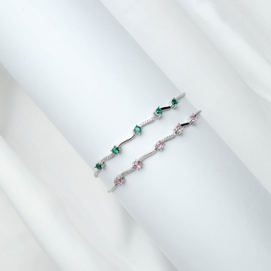 QuinShine delicate rose gold bracelet with pink and green gemstone accents on a white background