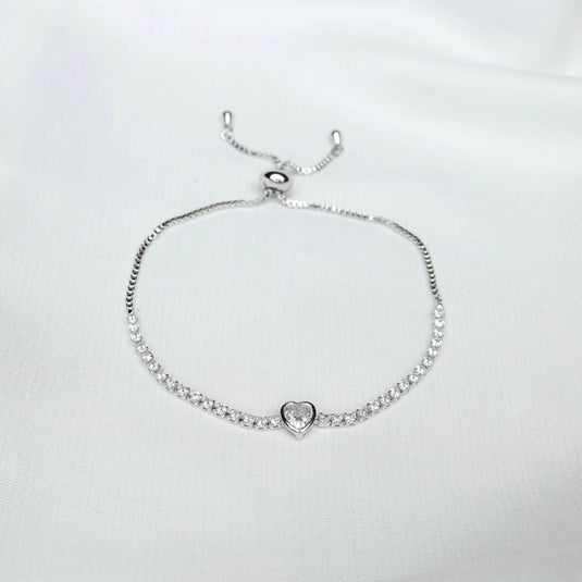 Delicate White heart charm bracelet with adjustable chain and sparkling crystal heart centerpiece