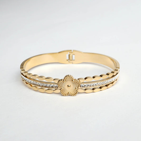 Gold bracelet from QuinShine featuring designer starburst jewelry with rhinestone detailing