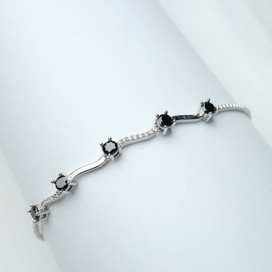 QuinShine silver bracelet featuring black stones and sparkling diamond accent jewelry design
