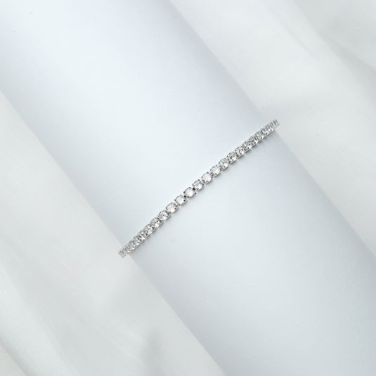QuinShine elegant diamond tennis bracelet with round-cut stones in a classic setting