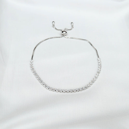 QuinShine delicate diamond tennis bracelet with adjustable clasp on white background
