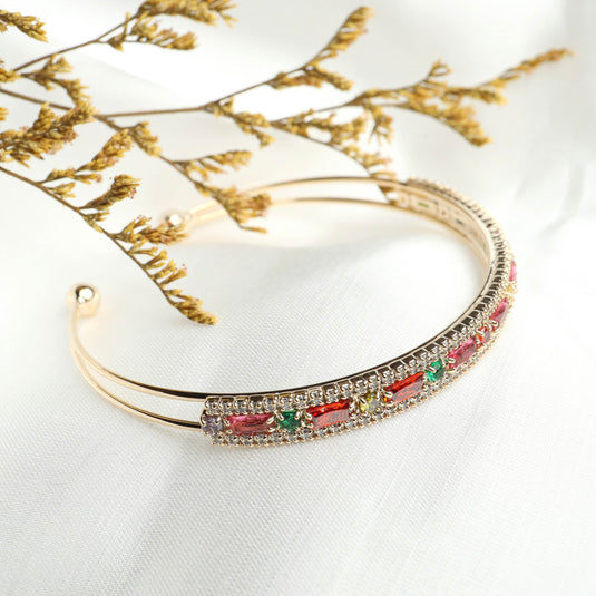QuinShine elegant cuff bracelet with pink and green gemstones on gold-tone metal