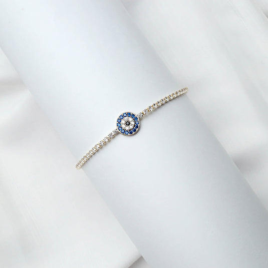 Elegant gemstone with evileye bracelet featuring blue and clear stones on a delicate silver chain by QuinShine