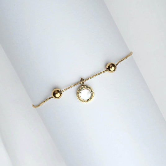 Elegant gold sphere charm bracelet by QuinShine with delicate chain and round charm