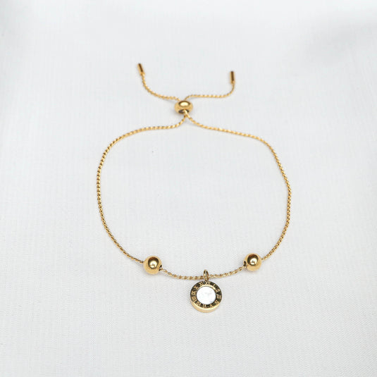 QuinShine elegant gold sphere charm bracelet with adjustable chain and circular pendant on white background