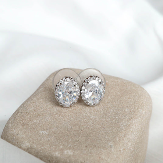 QuinShine elegant silver jewelry oval crystal stud earrings with sparkling stones on beige stone