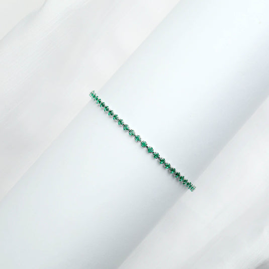 QuinShine emerald tennis bracelet with a delicate row of vibrant green emerald gemstones