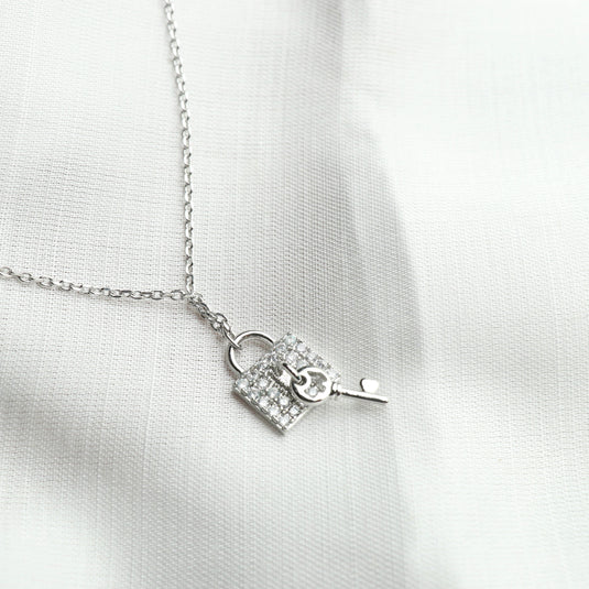 Silver fashionable key charm Necklace with sparkling stones on a delicate chain