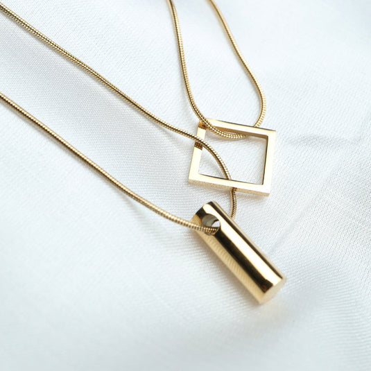 Gold cylindrical bar pendant necklace with geometric square pendant on delicate chain
