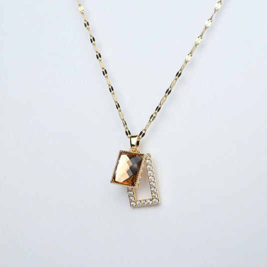 QuinShine geometric pendant necklace with gold chain and sparkling rectangular crystals