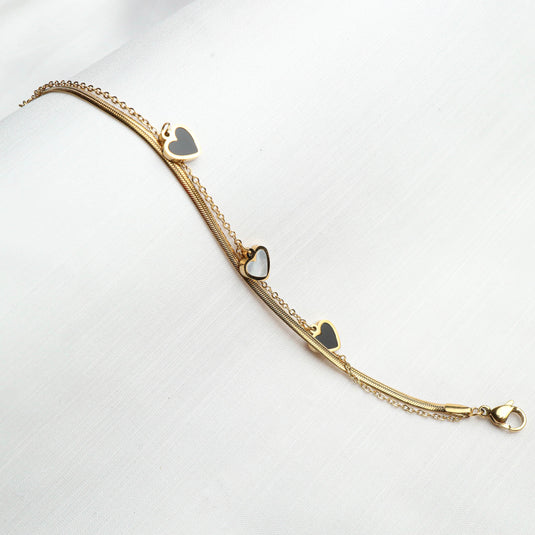 QuinShine delicate gold heart charm bracelet with three small heart pendants on fine chain