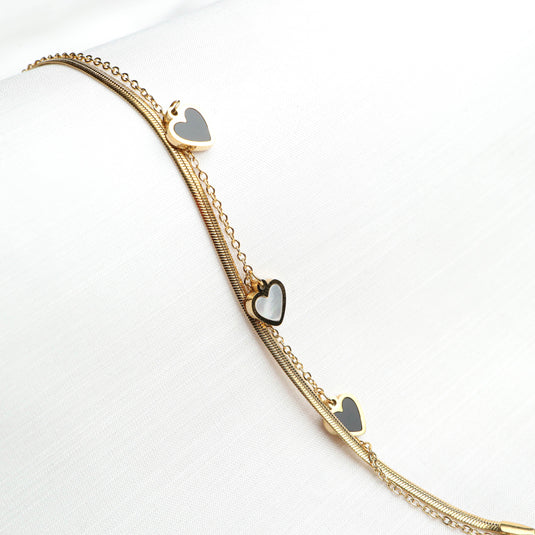 QuinShine elegant gold heart charm bracelet with three reflective heart pendants on delicate chains
