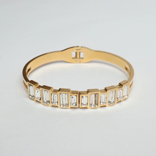 QuinShine gold high-end fashion bracelet with rectangular clear gemstones in a sleek design
