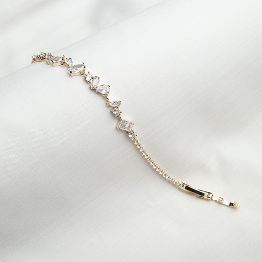 QuinShine luxury tennis bracelet for women with sparkling clear gemstones on gold setting