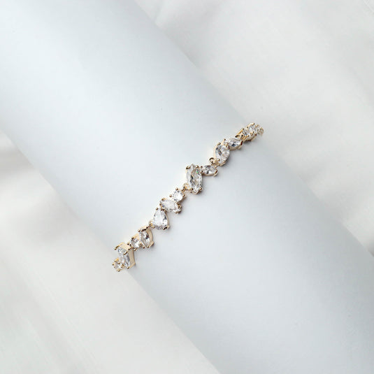 QuinShine luxury tennis bracelet for women with sparkling clear gemstones set in gold
