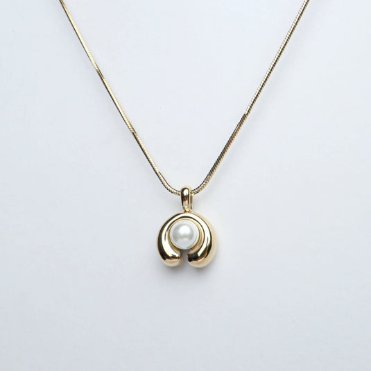 QuinShine modern pearl pendant necklace with gold-tone curved design and single white pearl centerpiece