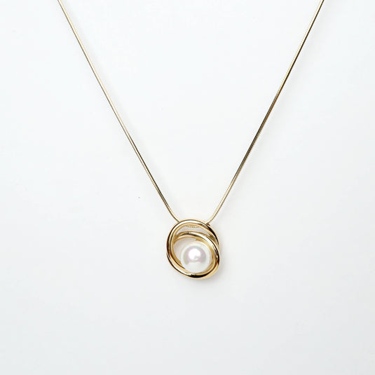 QuinShine gold pearl necklace with a single white pearl pendant on a delicate gold chain