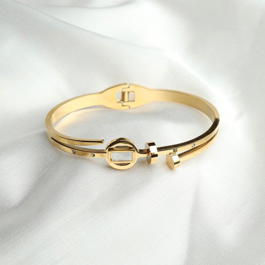 QuinShine elegant gold tone sleek arch bracelet with geometric design and small crystal accents