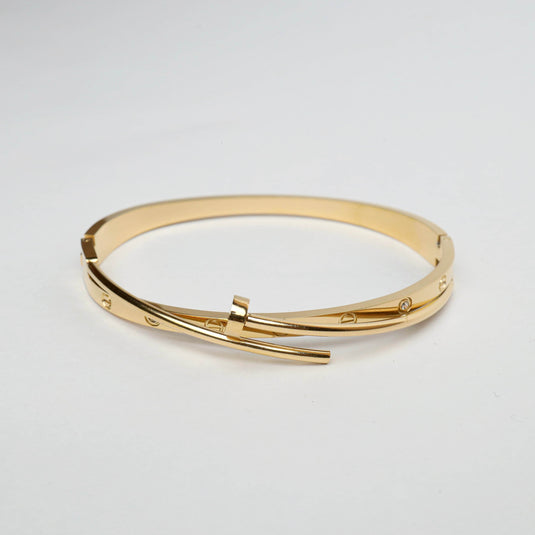 QuinShine gold tone sleek sculptural bracelet with minimalist design and subtle details