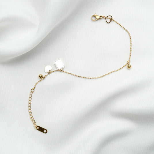 QuinShine golden keepsake bracelet with unique charm designs and adjustable chain for a personalized touch