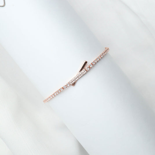 Rose gold bracelet with intersect design jewelry and sparkling stones from QuinShine online jewellery store