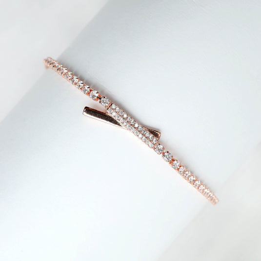 Rose gold bracelet with sparkling stones and elegant intersect design jewelry from QuinShine