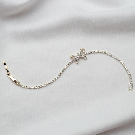 QuinShine diamond accent bow bracelet with sparkling stones on a delicate chain