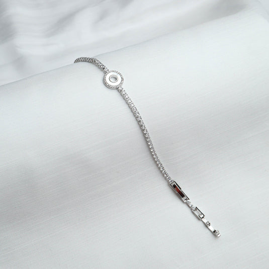 QuinShine Lunar Glow tennis bracelet in silver with a circular charm and adjustable clasp