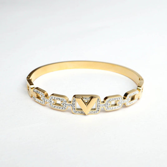 QuinShine luxury brilliance bracelet with gold and sparkling crystal accents on linked design