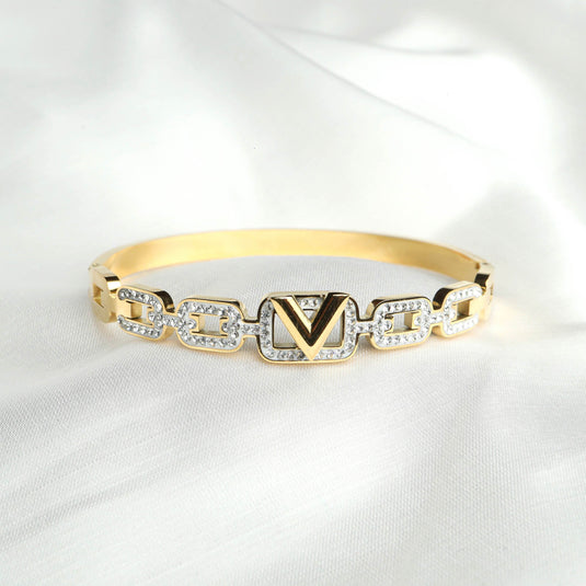 QuinShine luxury brilliance bracelet gold bangle with crystal encrusted chain links and central V emblem