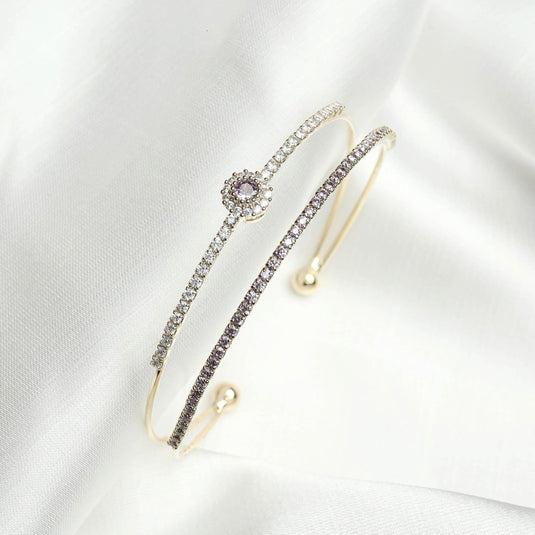 QuinShine luxury double band bracelet with sparkling crystals and gold-tone finish on white fabric