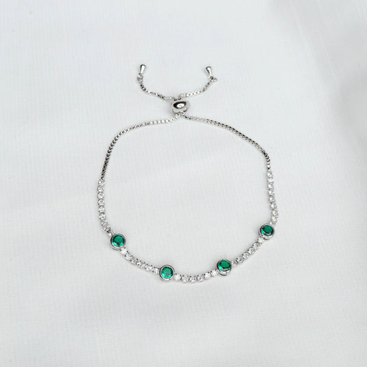 QuinShine luxury emerald jewelry bracelet with green stones and silver chain on white background