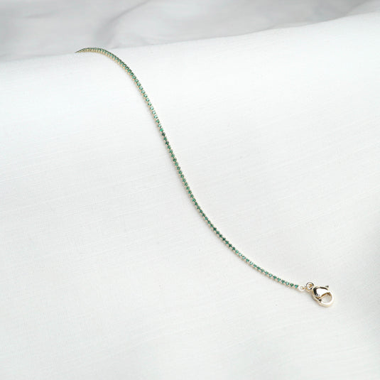 QuinShine luxury green gemstone bracelet with delicate green stones and silver clasp on white background