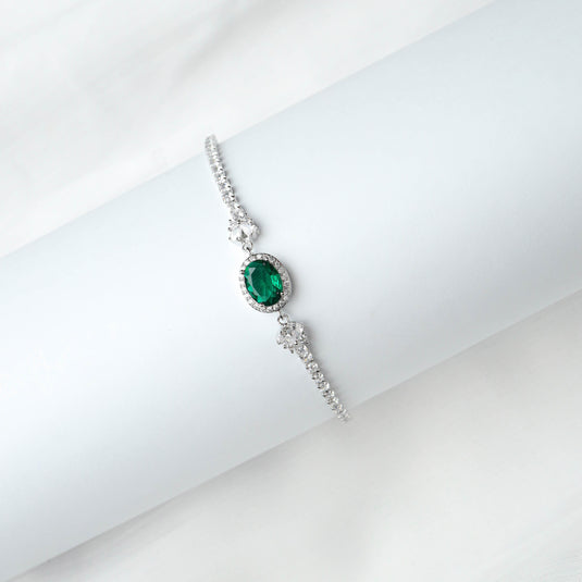 QuinShine luxury green stone bracelet with oval emerald centerpiece and silver band accented with small clear stones